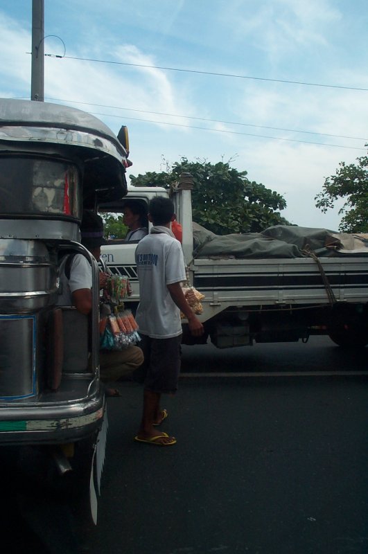 Jeepney-hopping street vendors in Tondo