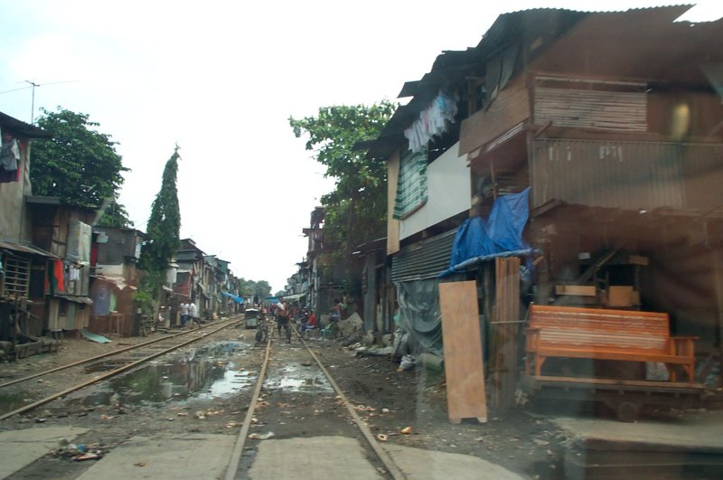 Rail crossing C3 road in Caloocan -- nothing much has changed here either...