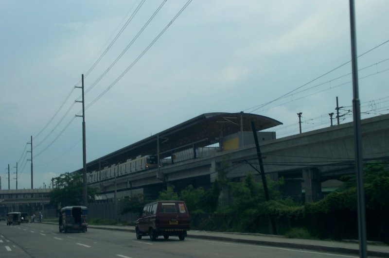 MRT station. Without a train on the tracks, the waiting passengers always looked to me like they are about to jump.