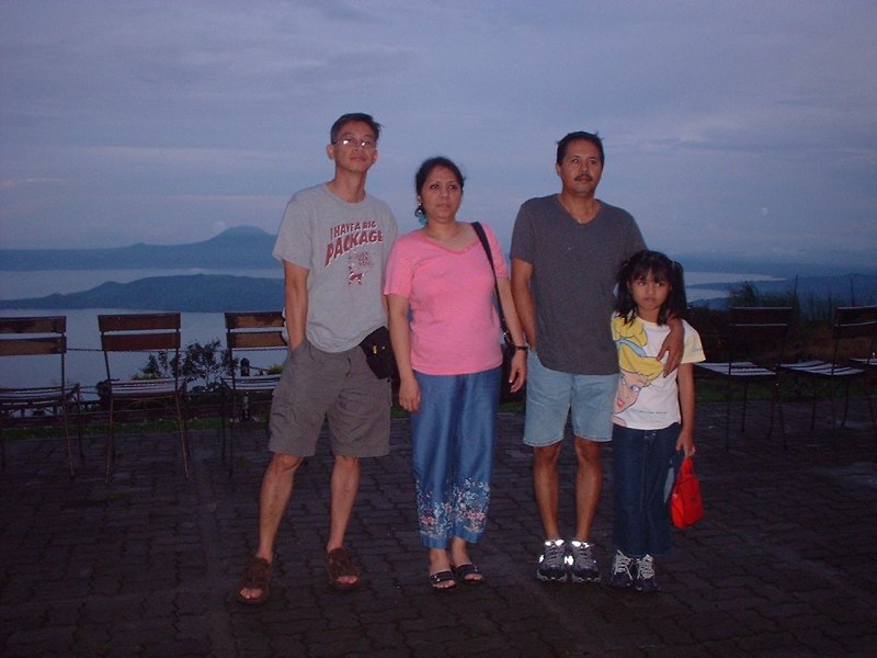 Me, Vi, Erwin, and Damdam. No this is not taken from Madame Tussaud's. The Taal lake backdrop isn't fake and the people are not wax dummies.